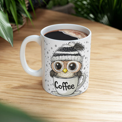 Ceramic coffee cup with owl design